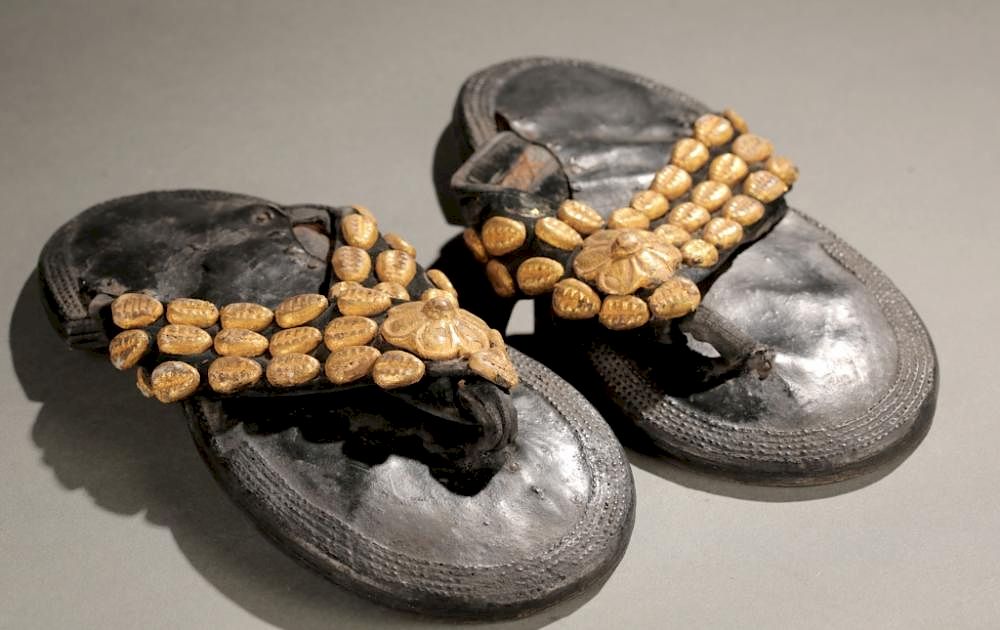 Appraisal: Akan sandals with gold leaf th century A pair of