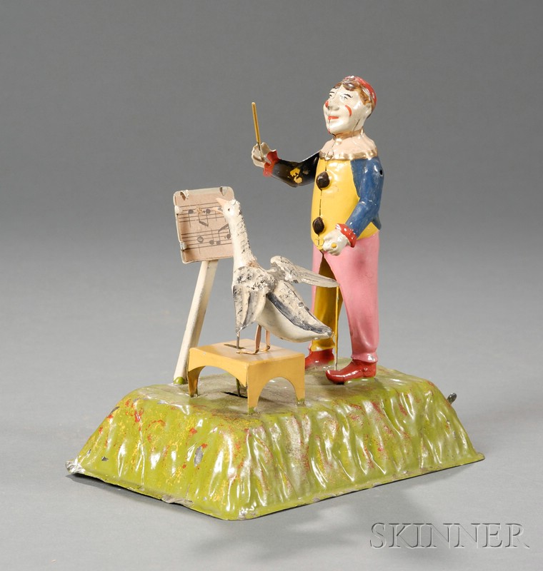 Appraisal: Painted Tin Wind-up Toy with Clown and Musical Goose attributed