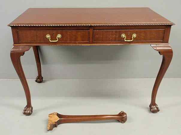 Appraisal: Chippendale style mahogany library table with two drawers As found