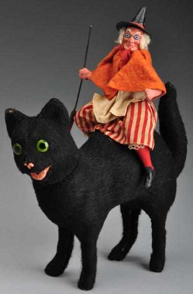 Appraisal: Halloween Witch Riding Black Cat Candy Container Description Cat is