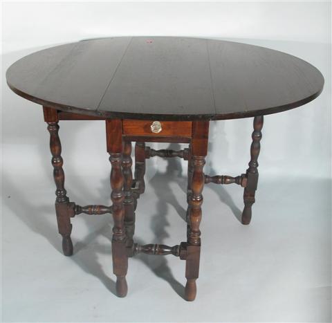 Appraisal: WILLIAM AND MARY STYLE DROP LEAF TABLE The rectangular center