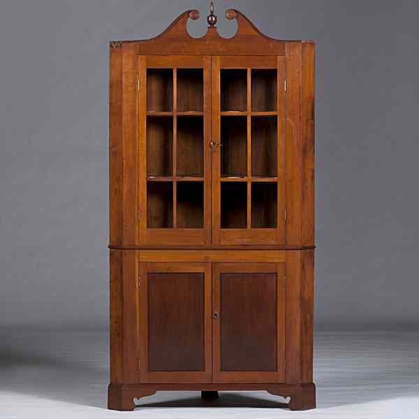 Appraisal: Kentucky Cherry Corner Cupboard Kentucky ca A corner cupboard in