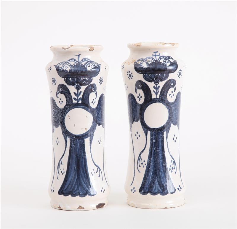 Appraisal: PAIR OF CONTINENTAL BLUE AND WHITE TIN-GLAZED EARTHENWARE BEAKER-FORM APOTHECARY