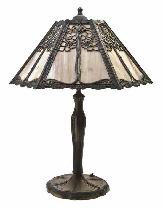 Appraisal: An American Gilt Metal and Slag Glass Table Lamp having