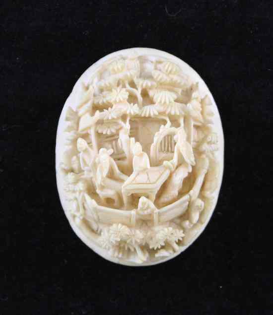 Appraisal: A Chinese export ivory oval medallion carved in high relief