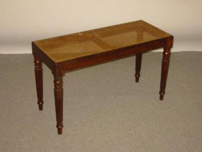 Appraisal: A CARVED MAHOGANY WINDOW SEAT c of oblong form with