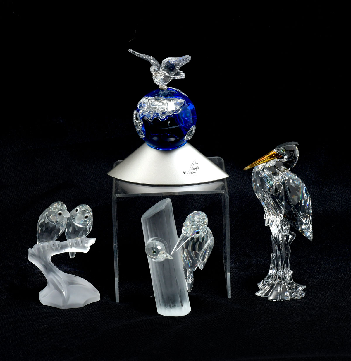 Appraisal: SWAROVSKI PIECE BIRD LOT The crystal planet as a limited