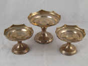 Appraisal: A set of three silver tazzas a pair and a