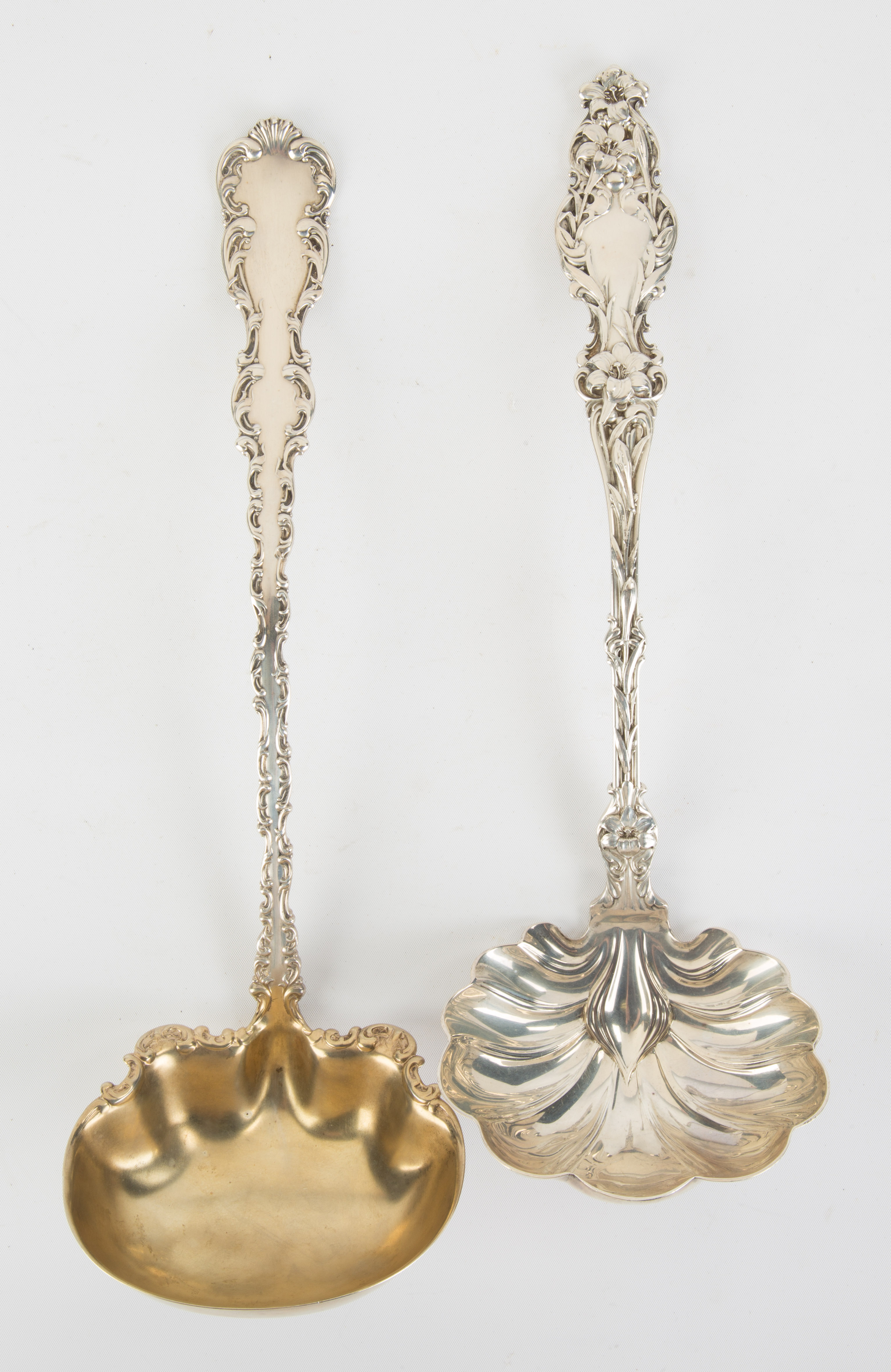 Appraisal: Two Whiting Sterling Silver Ladles Whiting Lily with shell bowl