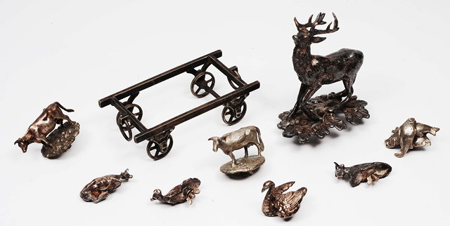 Appraisal: A small collection of various silver plated animalsincluding cows a