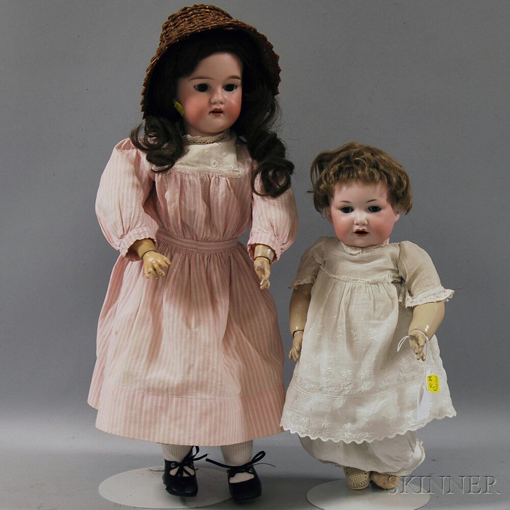 Appraisal: CM Bergmann Girl and AM Bisque Head Baby Doll Germany