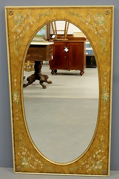 Appraisal: - Oval mirror with an ornately floral decorated rectangular gilt