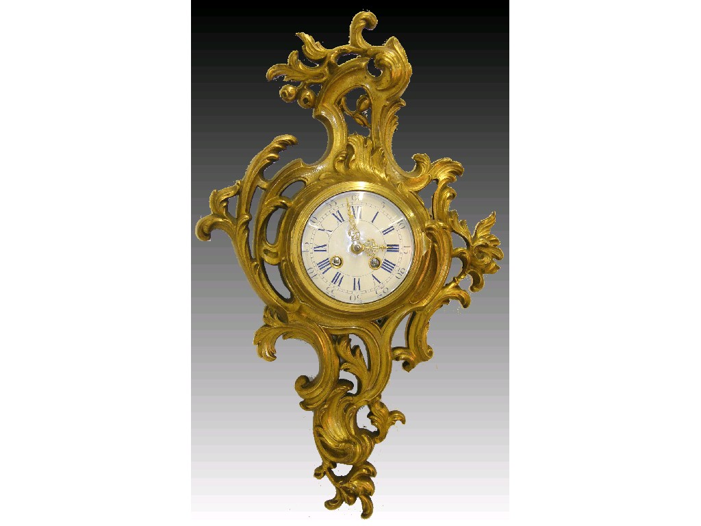 Appraisal: French ormolu two train cartel wall clock the Japy Freres