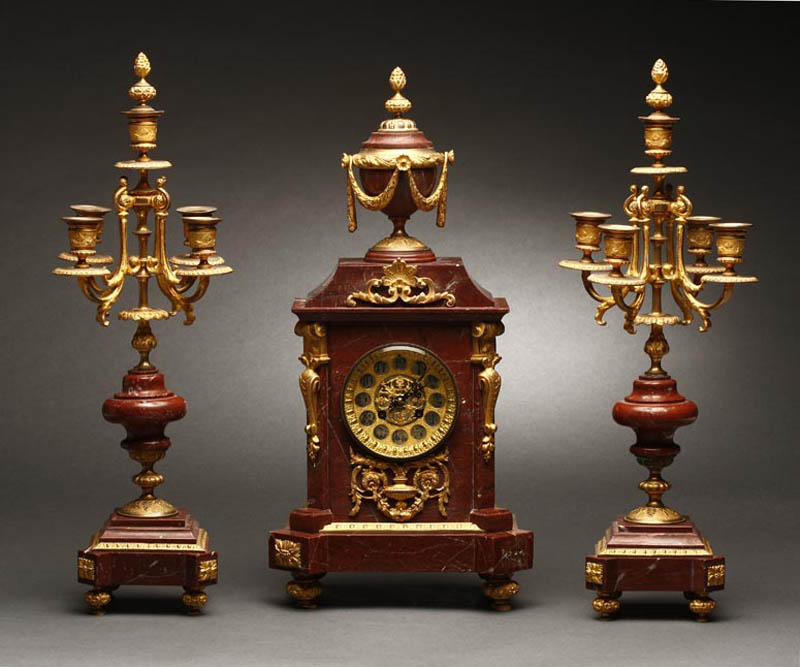 Appraisal: A Louis XVI style ormolu marble clock garniture A Louis