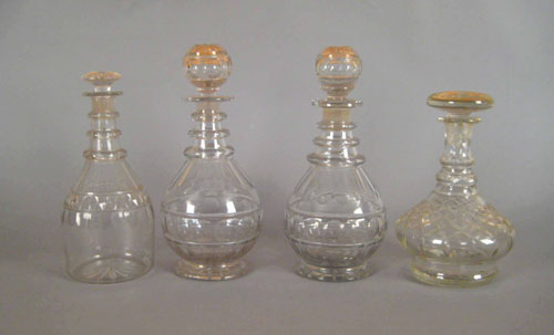 Appraisal: Four colorless glass decanters th c h two h and