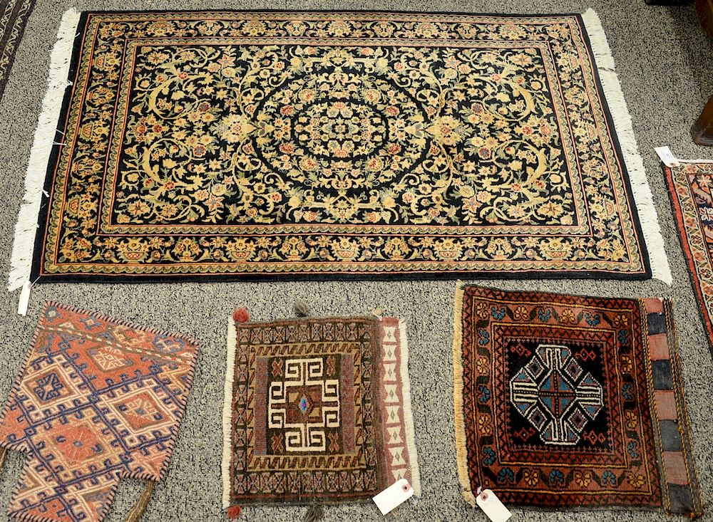 Appraisal: Twelve small Oriental throw rugs mats and two bags '