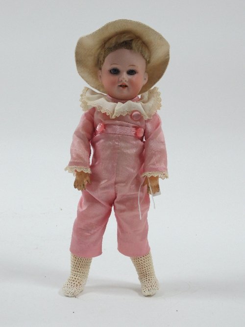 Appraisal: An Armand Marseille small bisque head doll the head impressed