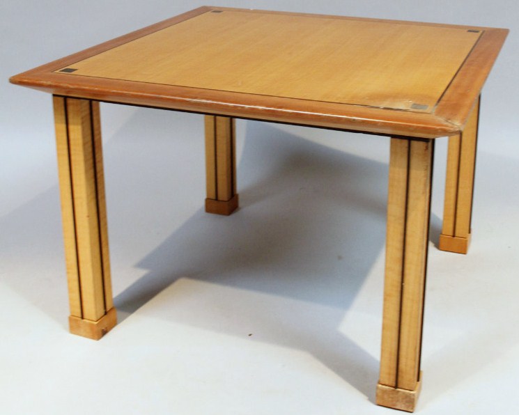 Appraisal: A thC maple finish Art Deco coffee table the square