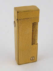 Appraisal: A gold plated Dunhill cigarette lighter