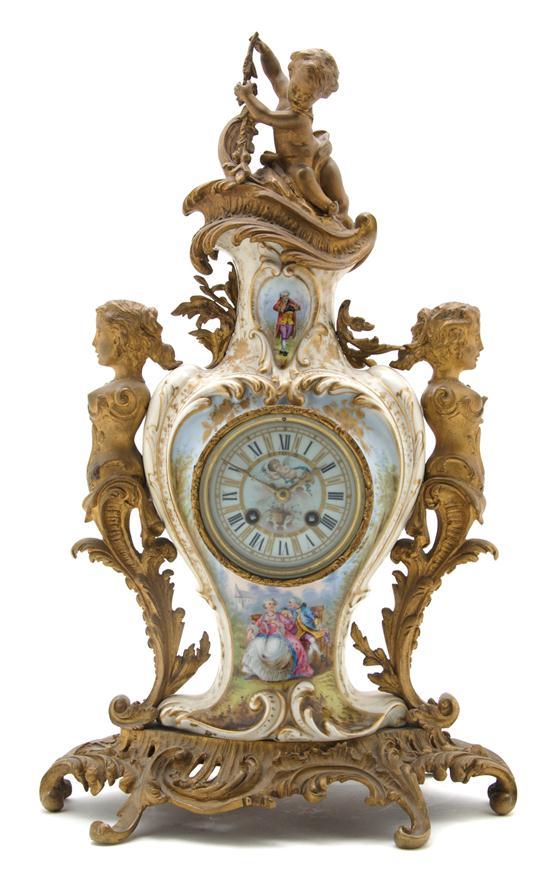 Appraisal: A Bronze Mantle Clock with Sevres Style Insets Retailed by