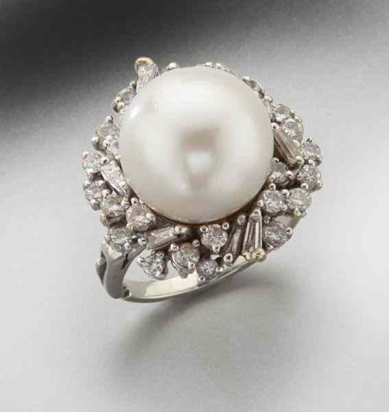 Appraisal: K gold South Sea pearl and diamond dinner ringfeaturing a