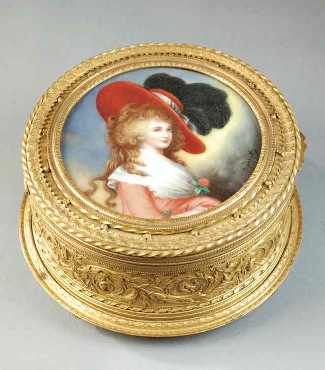 Appraisal: FRENCH ROUND JEWELRY BOX in gilt metal The cover inset