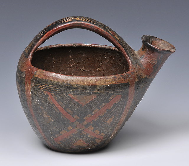 Appraisal: AN EARLY POTTERY WATER VESSEL probably North African with simple