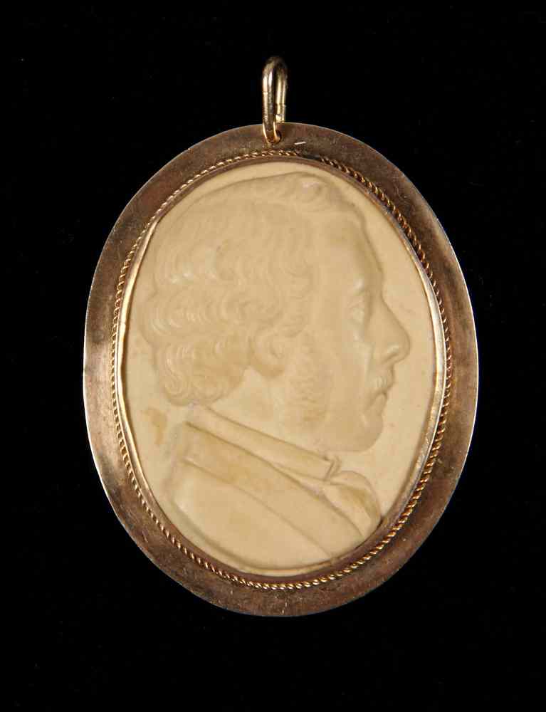 Appraisal: LAVA STONE PORTRAIT CAMEO-of a gentleman mounted in a gold