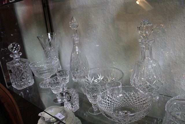 Appraisal: A COLLECTION OF CUT GLASS WARE to include decanters glasses