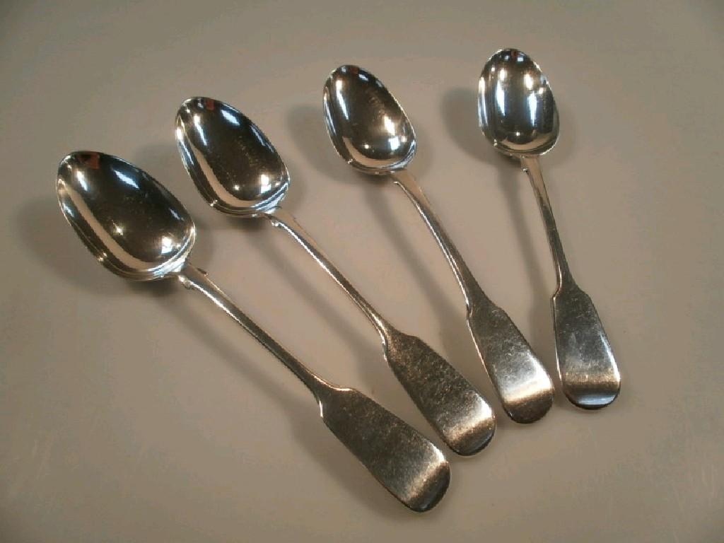 Appraisal: Three matching Victorian silver fiddle pattern serving spoons London and