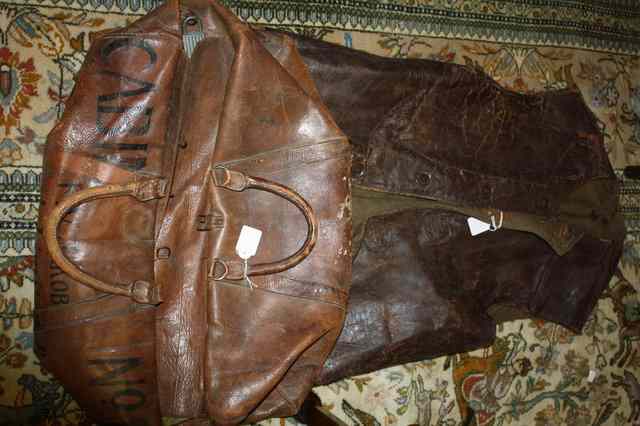 Appraisal: AN EARLY TH CENTURY LEATHER CABIN BAG together with a