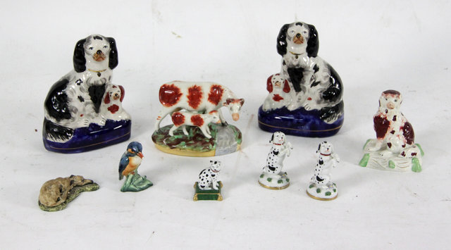 Appraisal: A collection of nine Staffordshire pottery and Samson porcelain figures