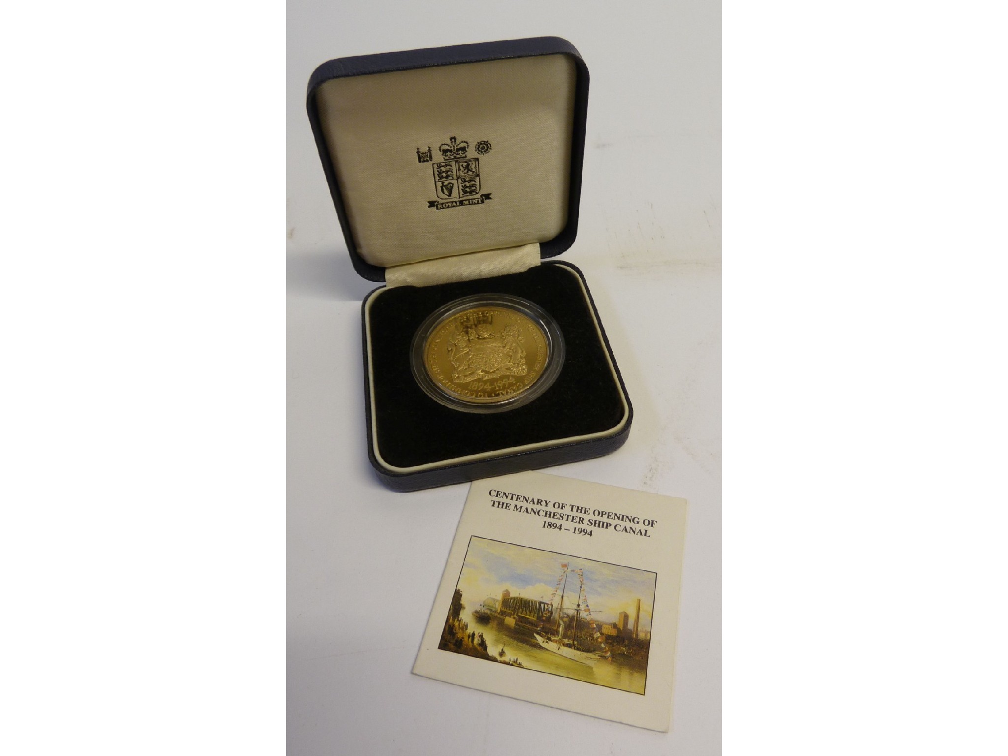 Appraisal: GILT METAL MEDALLION COMMEMORATING THE CENTENARY OF THE OPENING OF