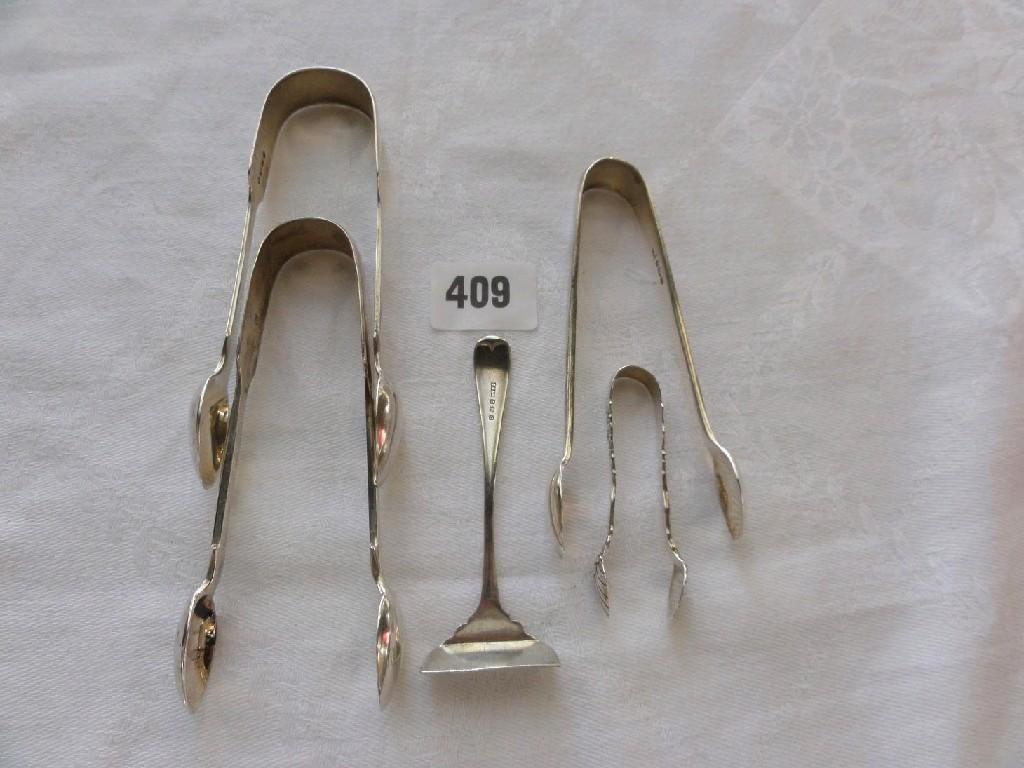 Appraisal: A collection of four pairs of silver sugar tongs and