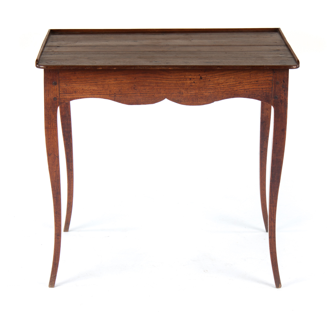 Appraisal: French Provincial chestnut writing desk th century flat top with