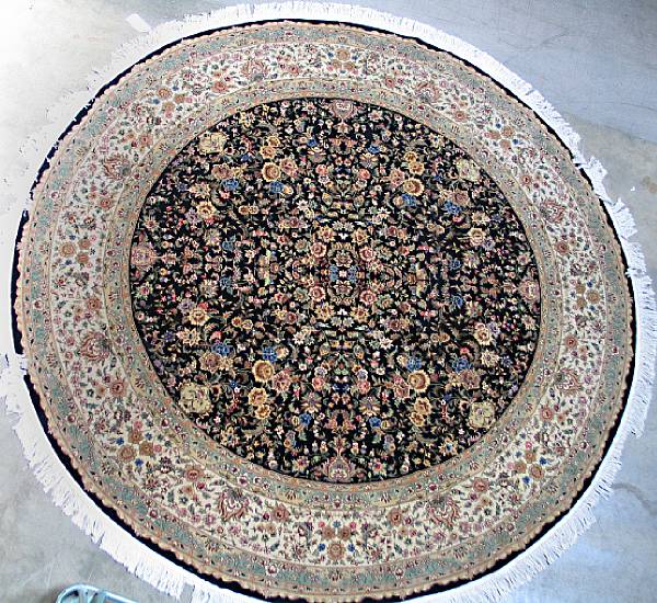 Appraisal: A Kashan design rug size approximately ft x ft