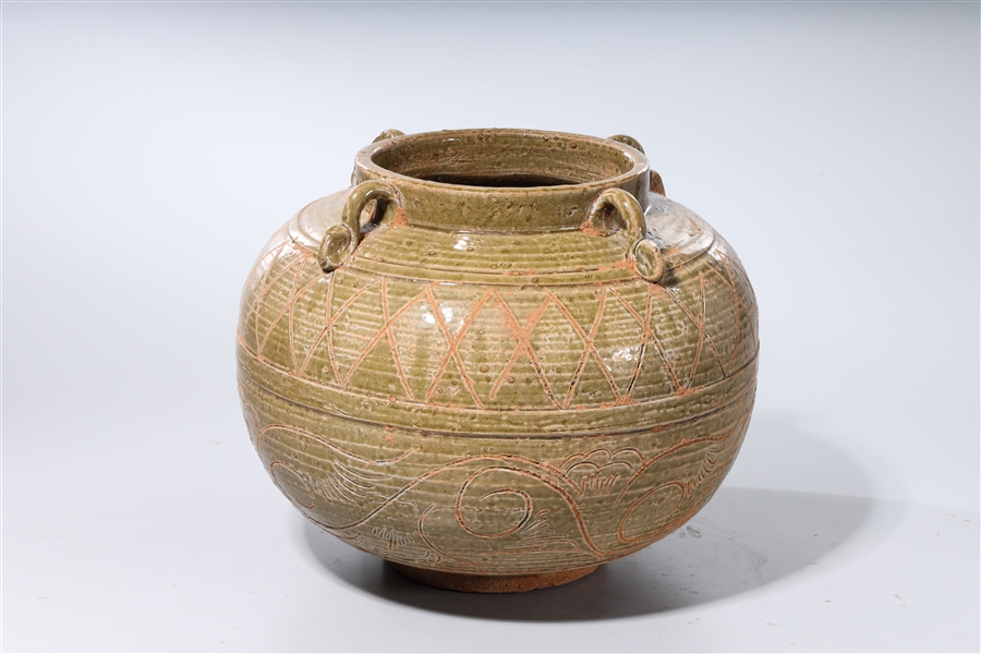 Appraisal: Chinese Han-style glazed ceramic jar with incised geometric and organic