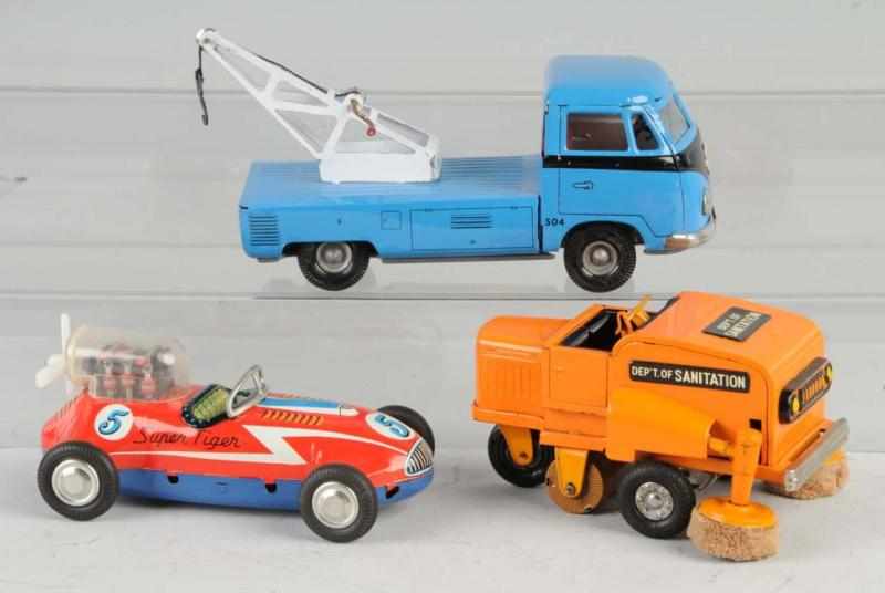 Appraisal: Lot of Tin Vehicle Friction Toys Description Includes one Japanese