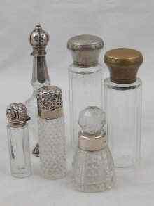 Appraisal: Four silver topped cut glass scent bottles one unmarked together