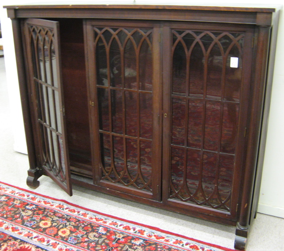 Appraisal: FEDERAL EMPIRE REVIVAL MAHOGANY BOOKCASE American c the interior divided