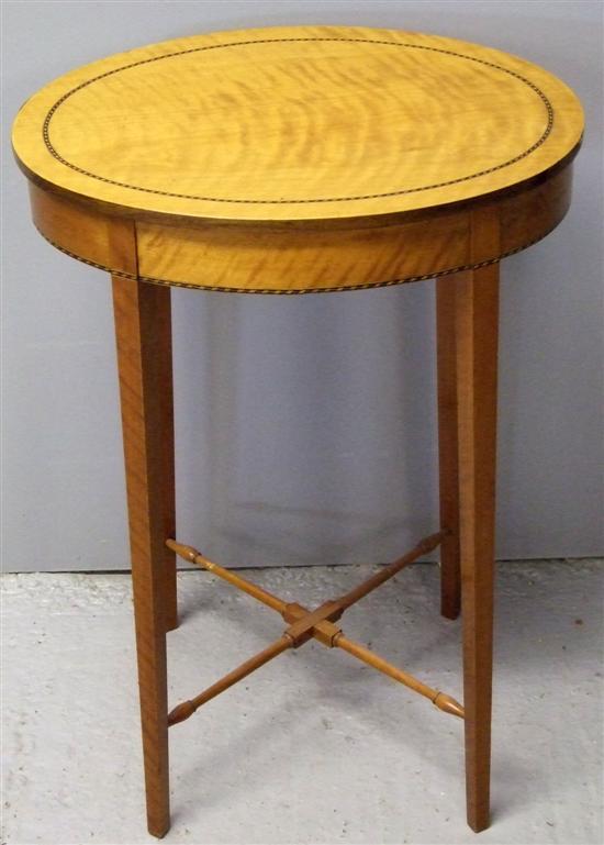 Appraisal: Satinwood and ebony strung oval occasional table on four tapering