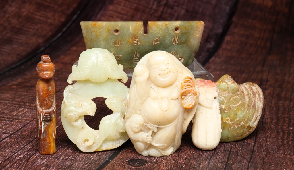 Appraisal: Twentieth century Various stones including jade and agate Hotei h