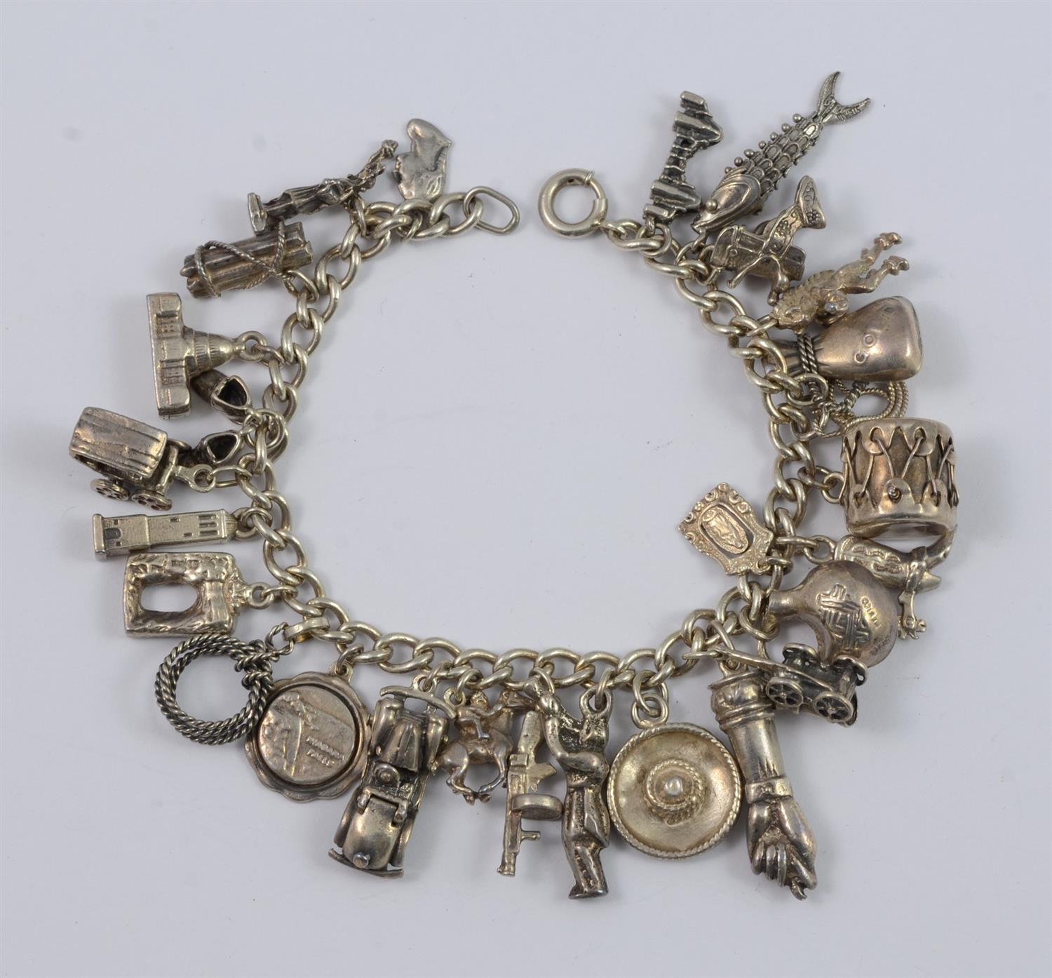 Appraisal: Silver Charm Bracelet Charms