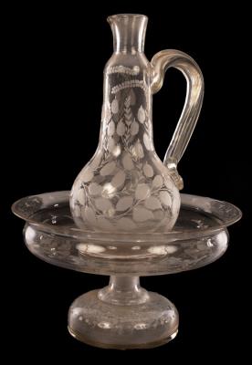 Appraisal: An early th Century circular engraved glass stand engraved foliage