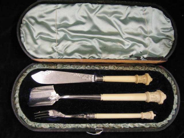 Appraisal: English Sterling Silver Carved Ivory Serving Set cheese soup pickle