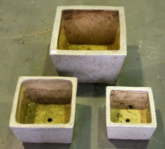 Appraisal: A set of three planters of square shape grey crackle