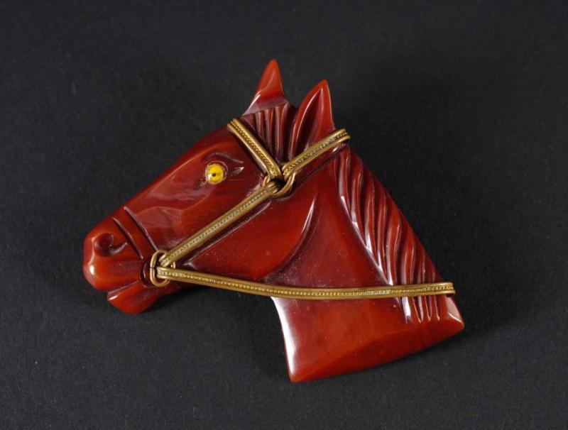 Appraisal: Bakelite Dark Red Horse Head Pin Condition Excellent Size -