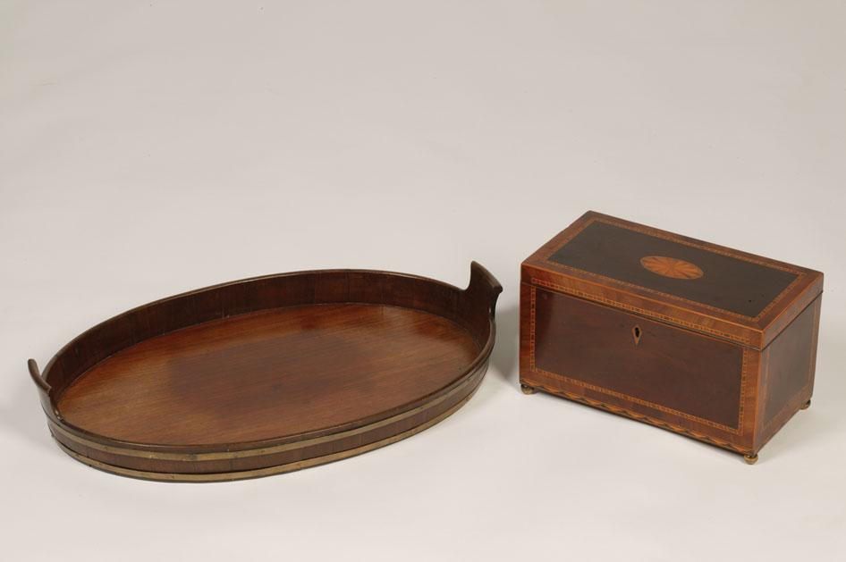 Appraisal: A GEORGE III MAHOGANY TRAY of oval form with a