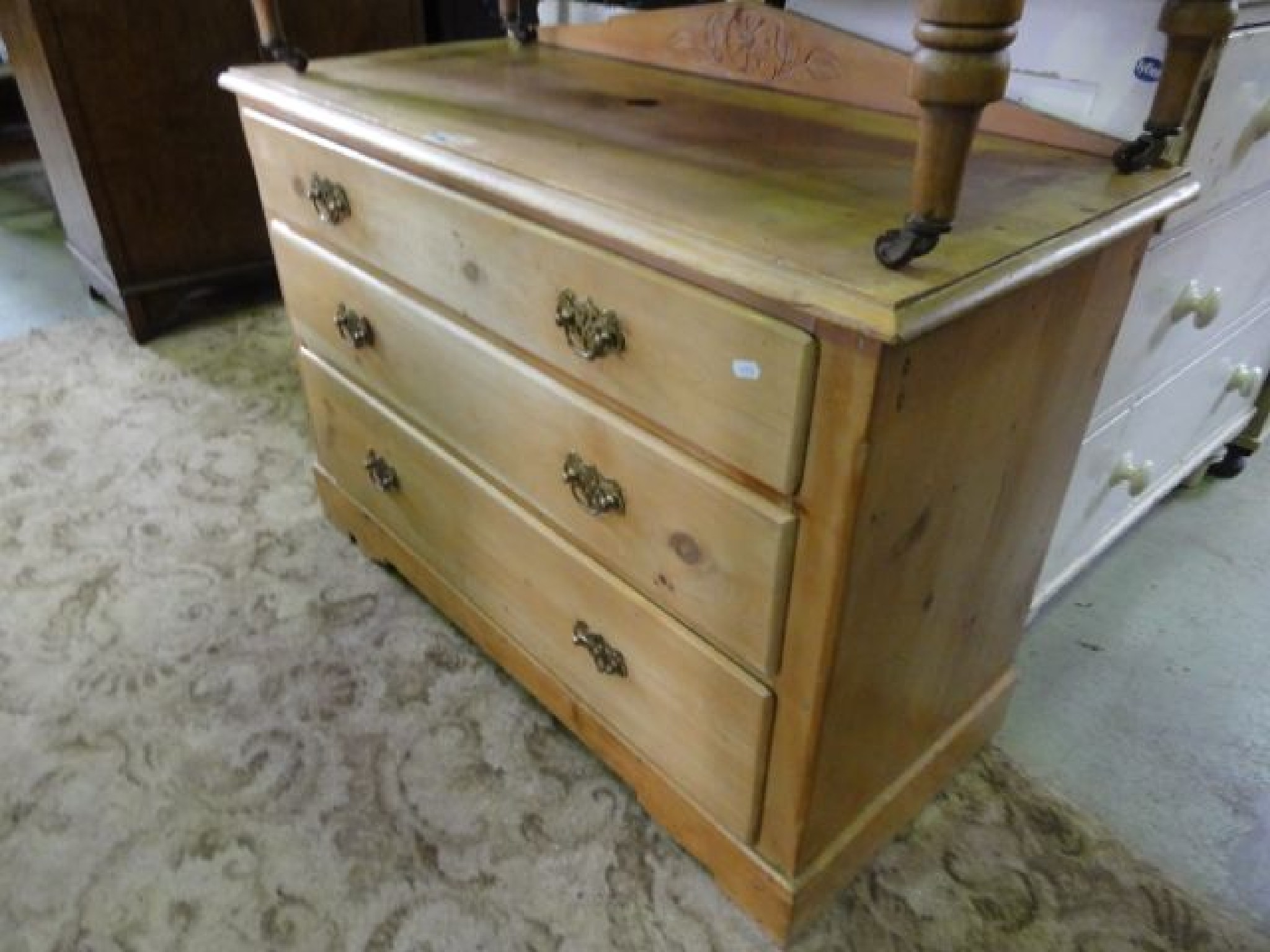 Appraisal: A late Victorian stripped pine bedroom chest of three long