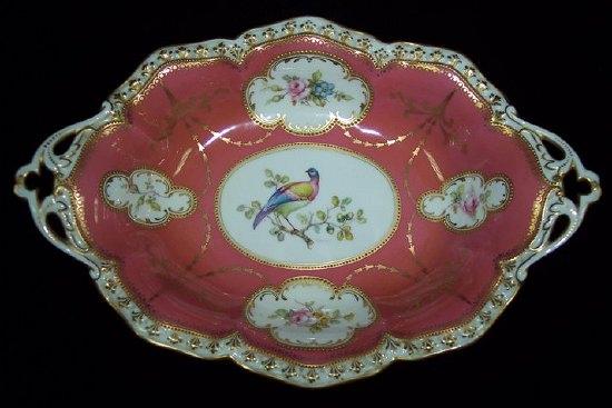 Appraisal: A Royal Crown Derby shaped dish painted with exotic birds